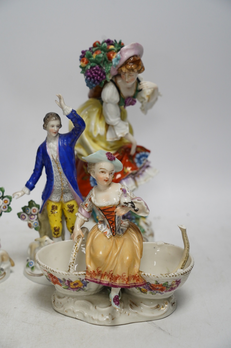 Four Samson porcelain figures and a pair of Dresden ‘children’ salts, tallest 23cm. Condition - salt handle broken